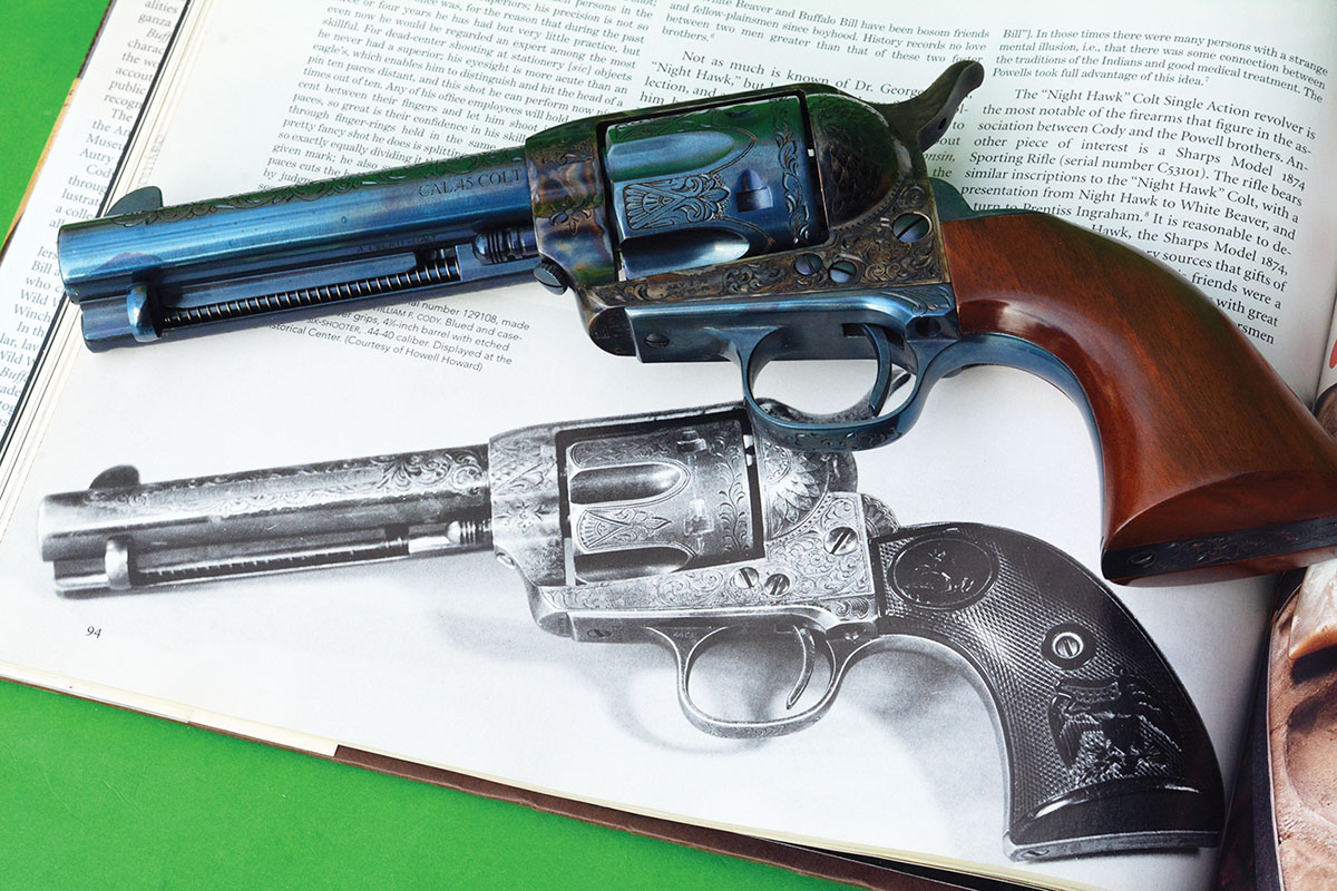 The original Colt Frontier Six Shooter 44-40 (bottom) as owned by Buffalo Bill. It is an elaborately engraved gun manufactured in 1889. The Cimarron Buffalo Bill tribute revolver (top) shares a similar pattern of engraving, a black-powder-style frame and is chambered in 45 Colt.